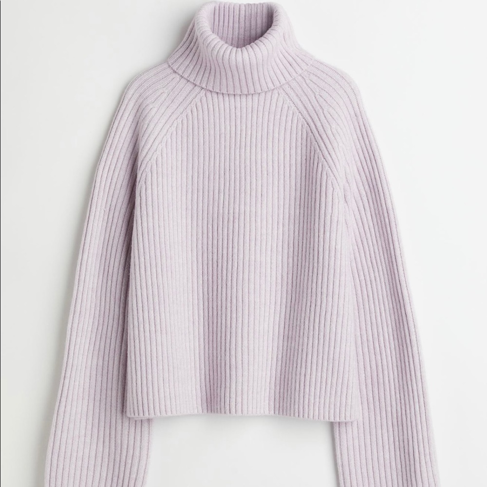 Relaxed fit turtleneck sweater in soft rib-knit fabric with wool content.